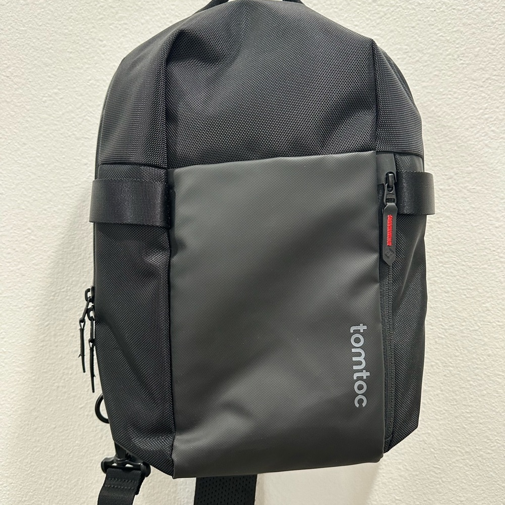 Tomtoc Men's Black Sling Backpack messenger laptop sleeve Compact shoulder bag